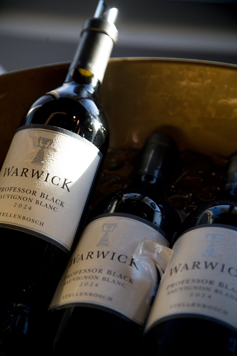 Warwick wine bottles in a gold-toned cooler at a previous Prime Wagyu wine event